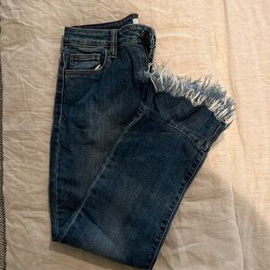 Fringe bottom jeans